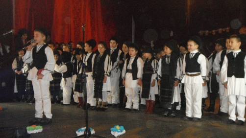 Novaci students wearing traditional costumes during the school's  Christmas festivities 
